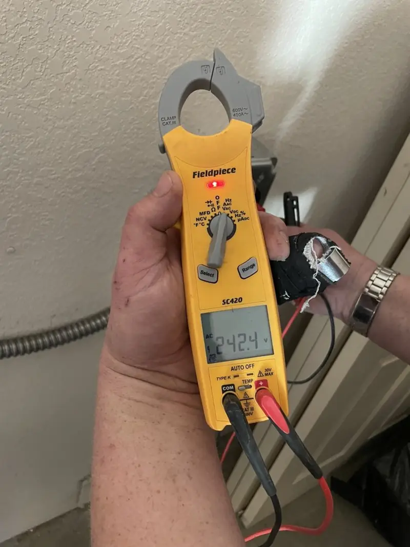 Voltage testing with clamp meter during Generator Installation in Butler